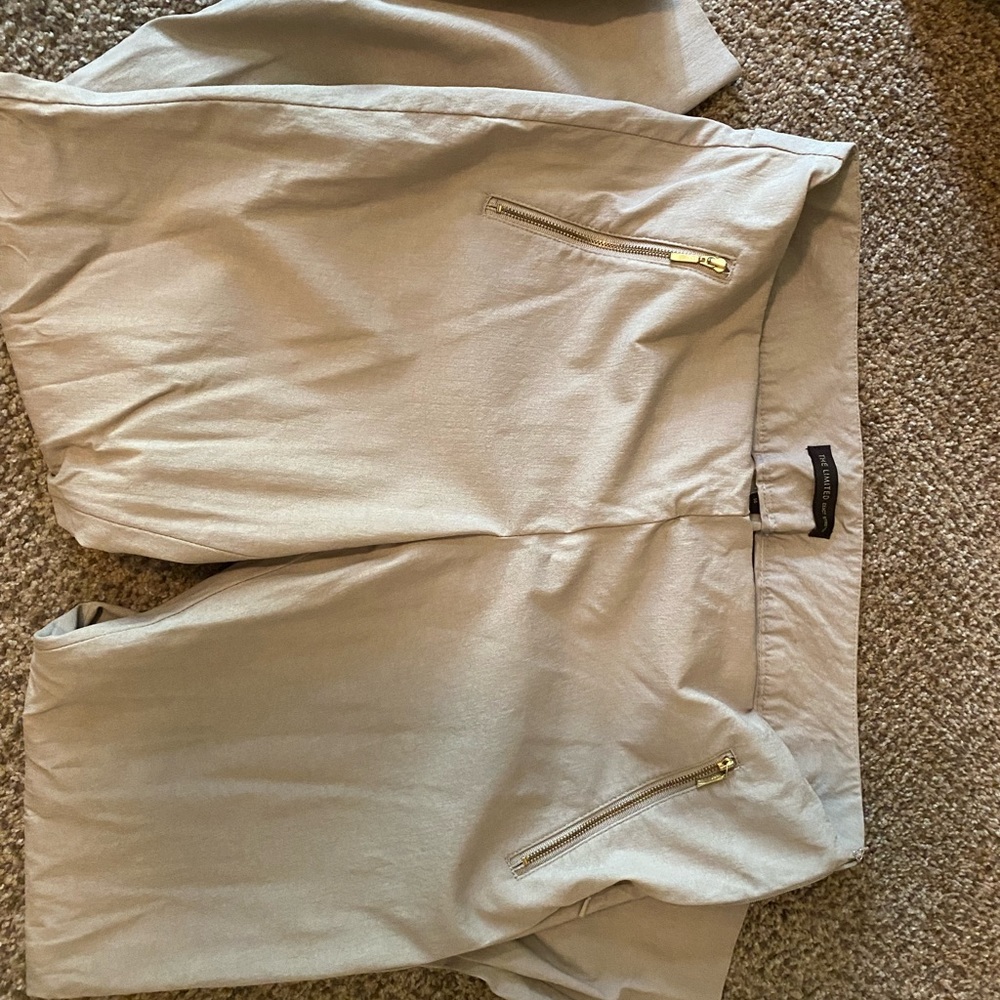 The Limited Exact Stretch Pants with side zip and zips on ankle.